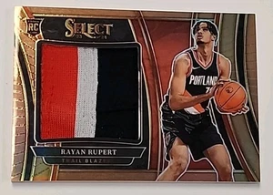 Rayan Rupert 2023-24 Select Jumbo Rookie Swatches Copper Prizm /49 RC - Bild 1 von 4