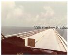 Found Color Photo F8479 View Out Car Window Looking Across Bridge