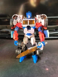 Takara Tomy Transformers United Un-22 Láser Optimus Prime 2009 Variante con Espada - Imagen 1 de 5