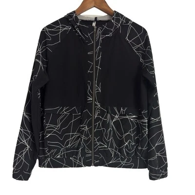 Chaqueta Fabletics Jiae para mujer blanca y negra elástica cremallera completa con capucha talla grande Foto 1 de 4