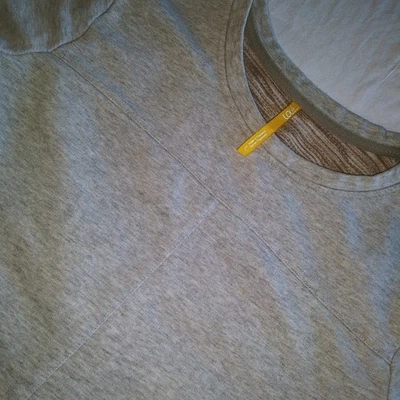 Sudadera Lole Athleisure Gris Jaspeado Cuello Redondo Manga Larga Bolsillos Dobladillo Curvo Foto 1 de 4