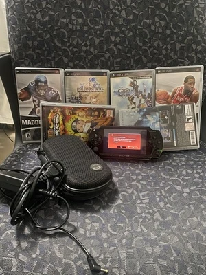 BLACK Sony PSP 1001 System w/ Charger Cage & 6 Game - Image 1 of 4