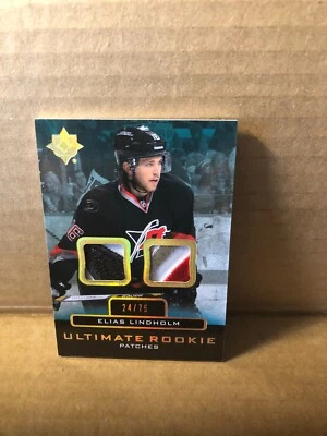 2013-14 Ultimate Collection Ultimate Rookie Patches #URJEL Elias Lindholm 24/75 - Image 1 of 2