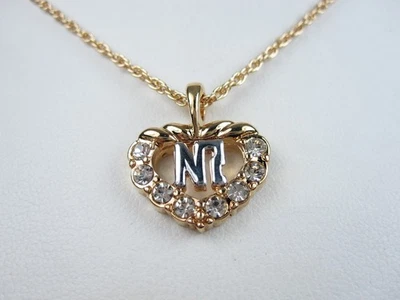 Colgante enchapado en oro Nina Ricci con cristales de Swarovski y logotipo sin precio base 16-18" - 8014 Foto 1 de 3