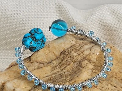 open bracelet, glass and turquoise stone in each end, weaved with small beads - Image 1 of 4
