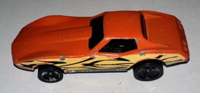 Coche diecast Hot Wheels 1:64 Corvette Stingray Orange Flames Malasia 1975 Foto 1 de 4