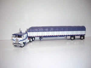 VAGÓN CUBIERTO DCP PRIMERA MARCHA 1/64 BLANCO Y AZUL PETE 352 COE DURMIENTE Y EJE EXTENDIDO - Imagen 1 de 11