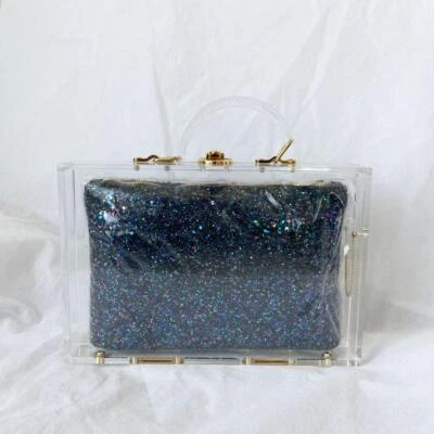 Charlotte Olympia Caja Clutch Acrílico Transparente + Bolsa Cremallera Azul Brillante Foto 1 de 4