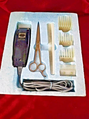 Kit de peluquero SUNBEAM vintage con maquinilla de afeitar funcional + delantal de peluquero Sears extra usado Foto 1 de 4