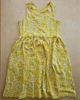 NUEVO CON ETIQUETAS VESTIDO SKATER HANNA DIFFERENTSON FLOR COMPLETA AMARILLO ESPALDA CRUZADA GIRATORIO 120 6 7 Foto 1 de 4