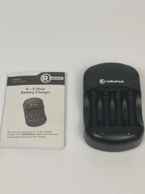 Radio Shack Battery Charger For AA or AAA Batteries With Manual - Image 1 of 3