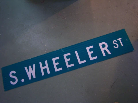 LARGE ORIGINAL S. WHEELER ST STREET SIGN 48" X 9" WHITE LETTERING ON GREEN Cover