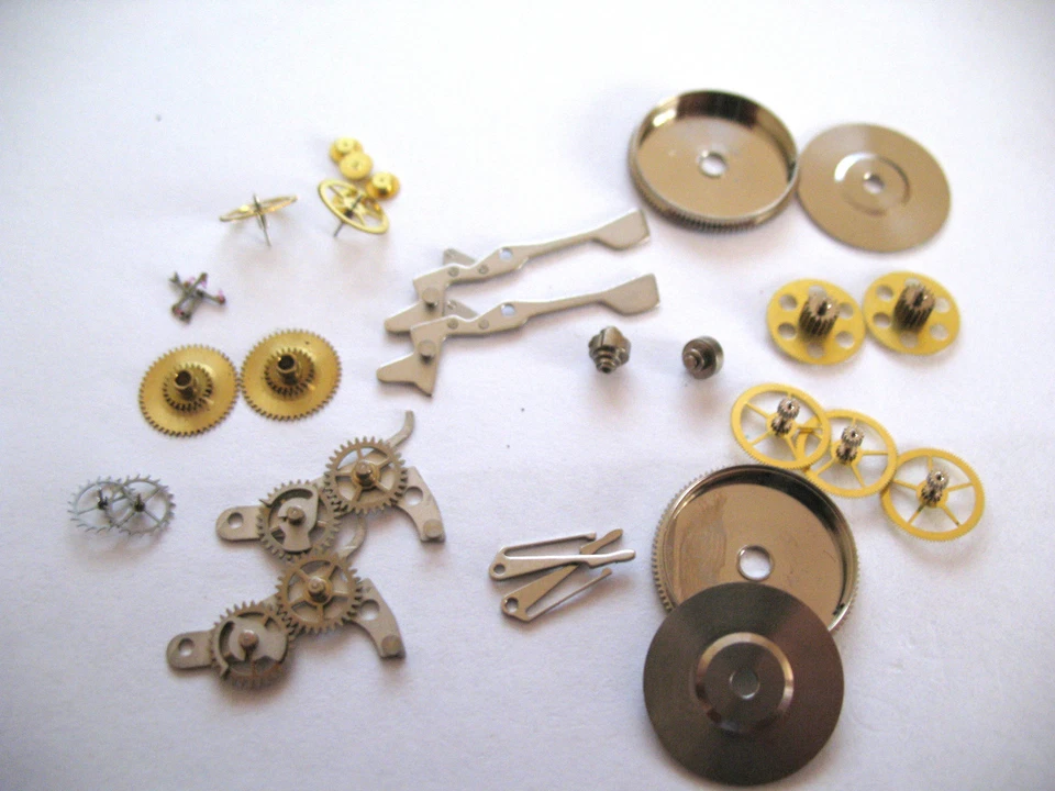 VALJOUX 7740,7741 HEUER 11,12,14  ASSORTED MOVEMENT PARTS - Image 1 of 1