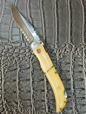 Navaja de bolsillo con punta de clip de acero inoxidable dentada con mango de hueso de ganado 440hc con clip Foto 1 de 4