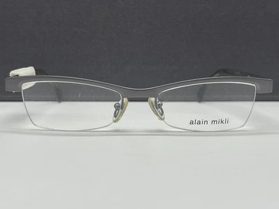 Monturas de gafas Alain Mikli para hombre mujer gris plata cuadrada media borde 2703 precio original: 371 € Foto 1 de 4