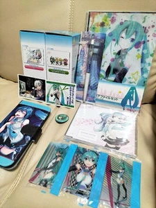 Hatsune Miku Vocaloid Goods Set - CDs, Smartphone Case, Wafers, Pins Used - Picture 1 of 19