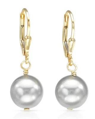 Preciosos pendientes con perlas de imitación hechos en plata de ley 925.  Foto 1 de 2