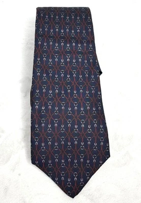 Corbata de seda Yves Saint Laurent de colección patrón ecuestre geométrico azul y rojo Foto 1 de 4