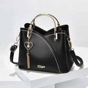 Women's Black with White Stitch Detail Handbag, Tassel Accents, Crossbody - Picture 1 of 7