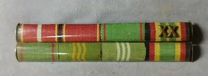 Pinza interina antigua NVA MDI metal/tela medalla al mérito servicios de fidelidad - Imagen 1 de 3