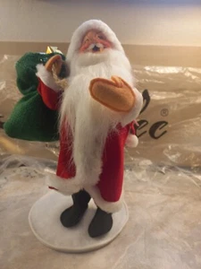 Annalee Winking Santa Claus Wearing Long Red Coat Holding Green Sack of Toys EUC - Picture 1 of 9