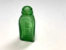 SAMPLE 3 IN ONE OIL CLEANS,OILS PROTECTS GREEN TINY 3 SIDED BOTTLE WITH CORK TOP