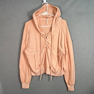 Sudadera pulóver con capucha melocotón pequeño Free People Movement para mujer con cordones delanteros Foto 1 de 4