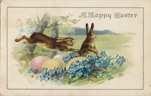 Postal de Pascua conejos marrones jugando flores azules huevos de Pascua - Imagen 1 de 2