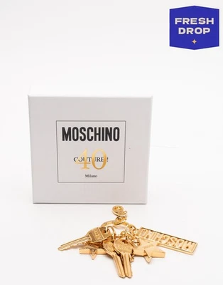 PVP €399 MOSCHINO Llavero Imitación Llaves Logo Estrella Dijes Hecho en Italia Foto 1 de 4