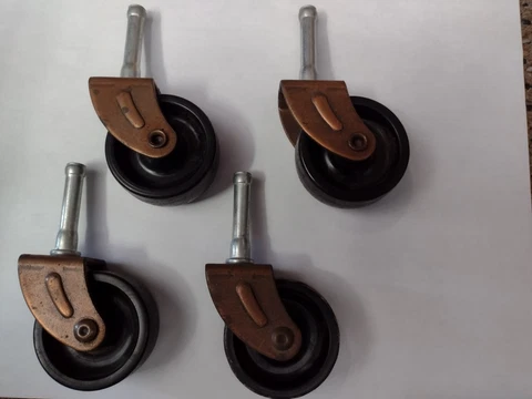 Vintage Plastic Copper Color Metal Caster Wheels Set of 4 *** Cover