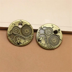 2x Antique Bronze 25/38mm Round Wheel Gear Cog Charms Steampunk DIY Accessories - Picture 1 of 8
