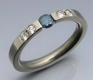 DISEÑO MADURO - MODERNO ANILLO TENSOR BRILLANTE 0,61 QUILATES - ÚNICO - Imagen 1 de 4