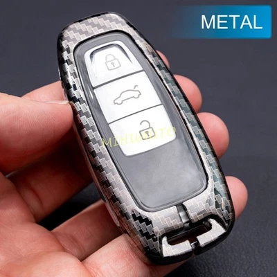Funda protectora de llavero de coche de metal de fibra de carbono para Audi S6 Q7 Q8 A3 A6 A7 A8 e-tron Foto 1 de 4