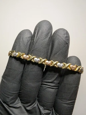 Solid 10k Tri-color Gold 7.5” 5.7mm Diamond Cut XO Heart Bracelet - Image 1 of 4