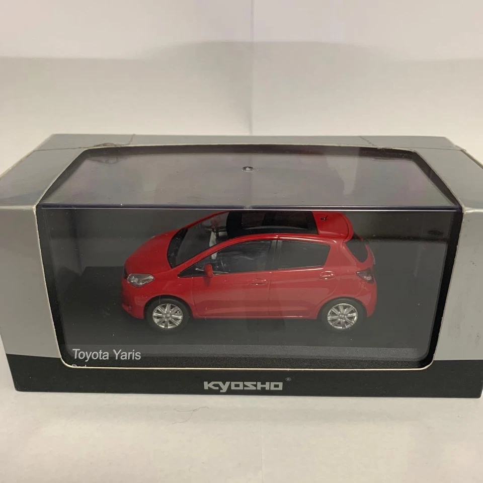 kyosho 1/43 Same day shipping  Toyota Yaris Red Left HDrive Minicar - Image 1 of 4