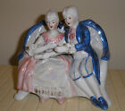 Pair Of Lovers Ceramic Luster Figurine.