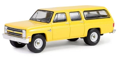 CHEVROLET Suburban K20 - 1987 - yellow - Greenlight 1:64 - Immagine 1 di 4