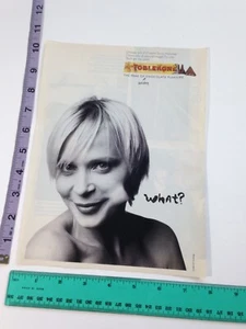 Print Ad / Magazine Clipping - Toblerone chocolate triangle in cheek photo ad - Bild 1 von 2