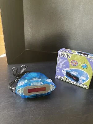 Radio reloj despertador de plástico translúcido azul transparente am/fm jWIN JL-505. Foto 1 de 3