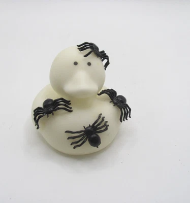 HAND DECORATED WHITE RUBBER DUCK W/ BLACK SPIDERS - Image 1 of 4