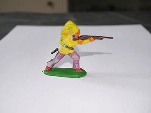  FIGURINE JIM CHEF INDIEN JAUNE PANTALON MAUVE DEBOUT TIRE AU FUSIL - Picture 1 of 2
