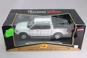 LJ518 MAISTO PREMIERE EDITION 36891 1/18 1:18 Ford Explorer Sport Trac pick up - Foto 1 di 8