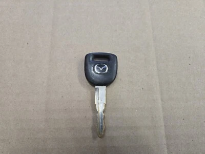 Оригинальный заводской черный и хромированный ключ зажигания для двери Mazda - Изображение 1 из 2