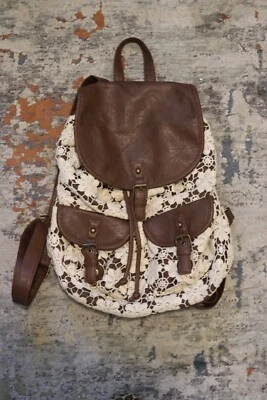 Mochila de ganchillo vintage de cuero sintético marrón Claire's años 90 Foto 1 de 4