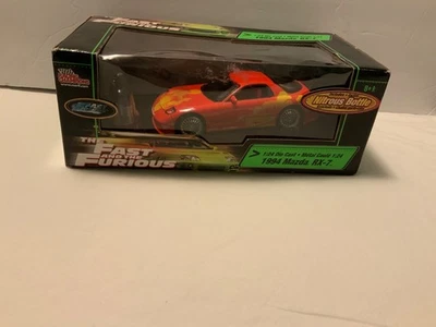 Racing Champions Fast And Furious 1994 Mazda RX-7 1:24 Car w/Nitrous Bottle Toy - Image 1 of 4