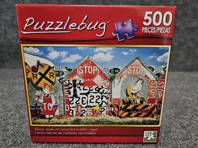 Puzzlebug 500 Piece Puzzle FENCE MADE OF RECYCLED TRAFFIC SIGNS - Image 1 of 4