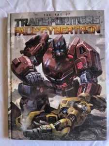 The Art Of Transformers Fall Of Cybertron HardCover IDW NM - Picture 1 of 2