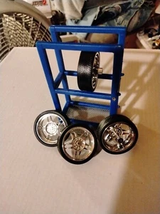 1:24 Jada (DubCity) ? Tire & Wheel Set-With Tire Rack (Blue) Lexus/Infinity ? - Picture 1 of 2