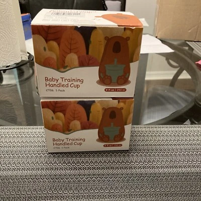 NUEVO LOTE DE 2 tazas portátiles de entrenamiento para bebés... TOTALMENTE NUEVAS VERDES Foto 1 de 4