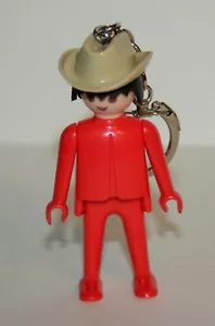 Playmobil Schlüsselanhänger rot Cowboy hellbraun Mütze Spielzeug Figur Promo Neu Neu Neu Neu Neu Lagerbestand 1974 Geobra - Bild 1 von 1